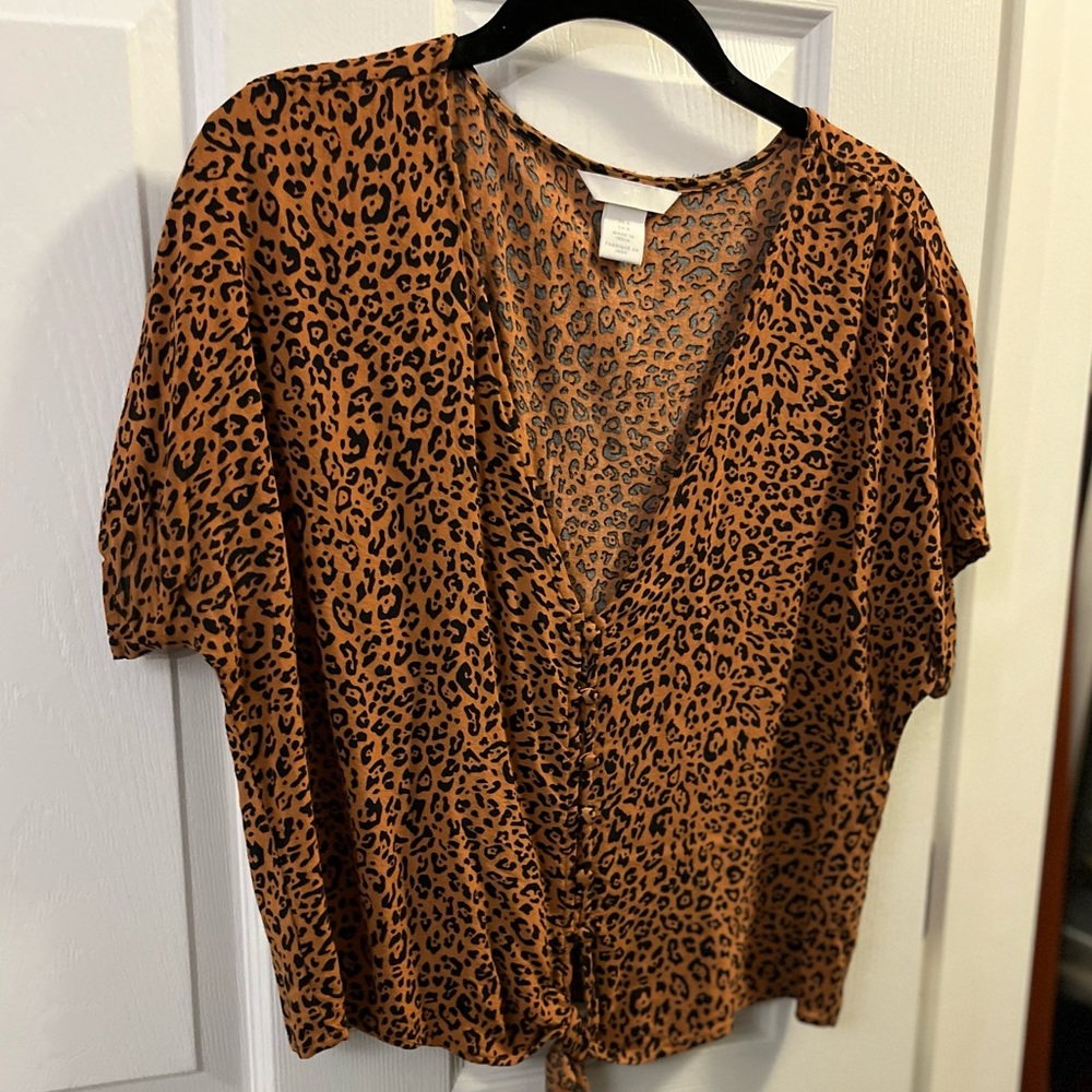 H&M medium leopard print button down shirt.